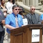 Randy Block speaks at a press conference.