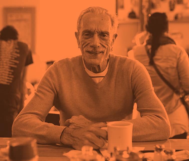 gay-man-at-senior-center-with-coffee-379x3242x gay-man-at-senior-center-with-coffee-379x3242x