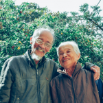 asian-couple-smiling-outside