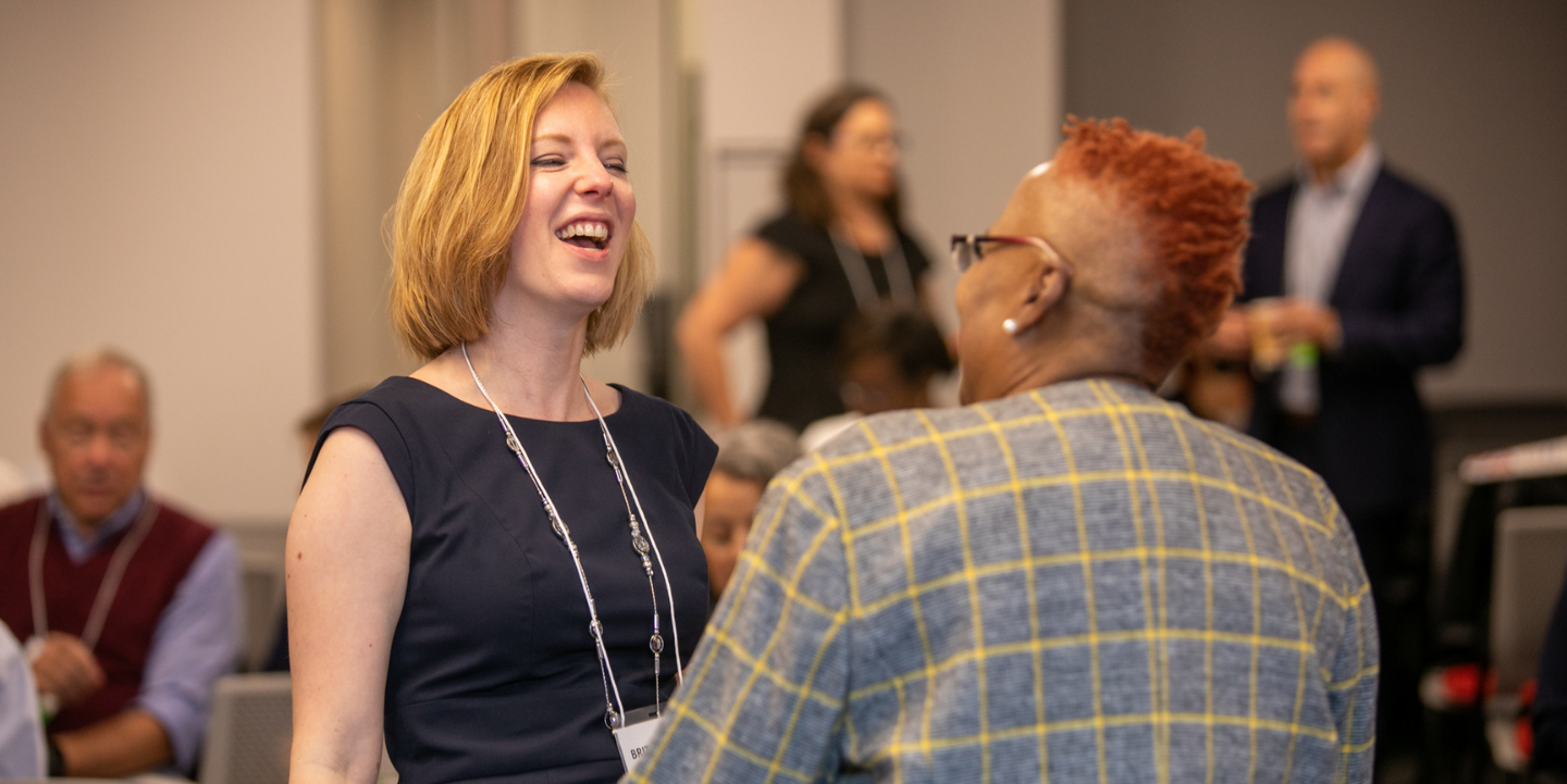 two-women-talking-at-SAGE-housing-event